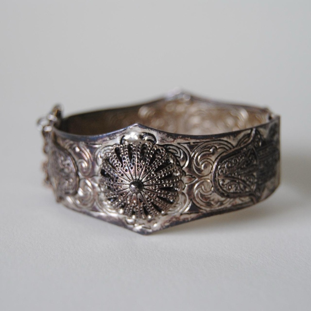 Elegant Silver Bracelet with Intricate Design